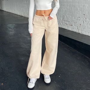 Tiger mist cream white parachute pants